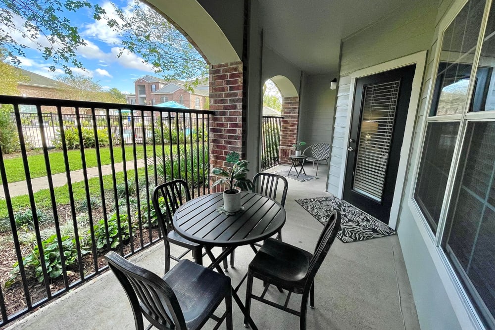 Private patio at an apartment at The Abbey at Barker Cypress in Houston, Texas