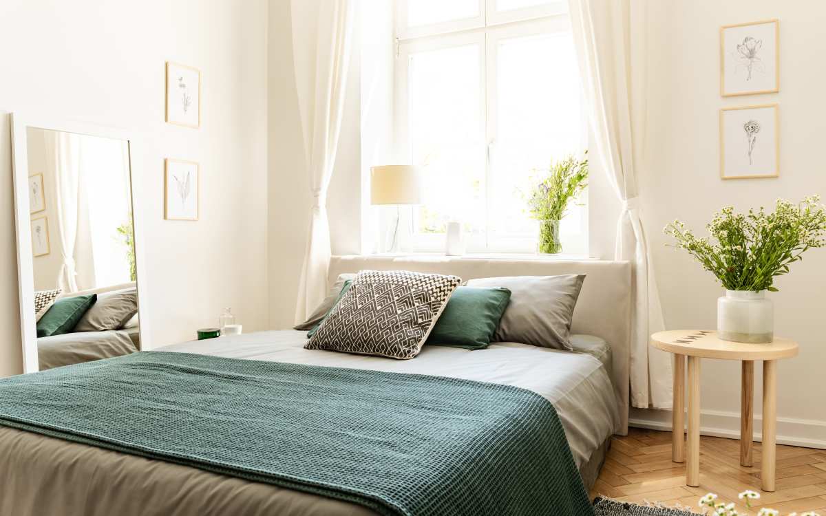 Model bedroom with window at Clintonville Commons in North Haven, Connecticut 