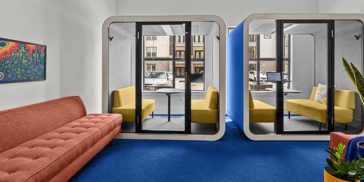 Resident lounge with study rooms at SunRidge Management Group in Dallas, Texas