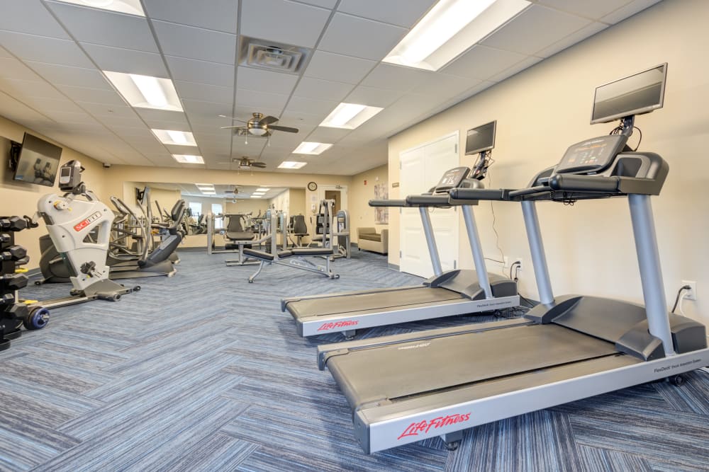 Fitness center at The Marquis at the Woods in Webster, New York