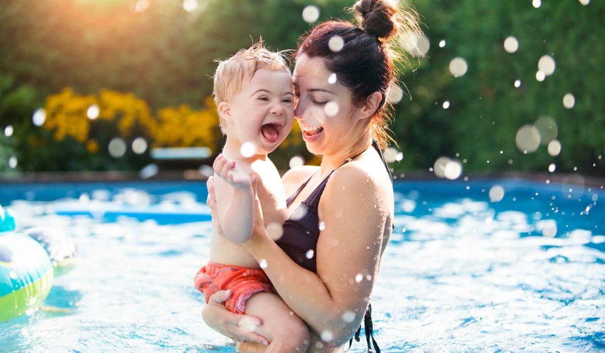 Mother and son playing in the pool at Keyway Apartments in Sparks, Nevada