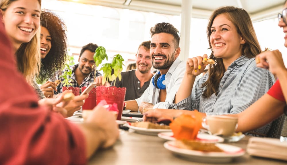 Residents eating lunch together at Texan 26 in Austin, Texas
