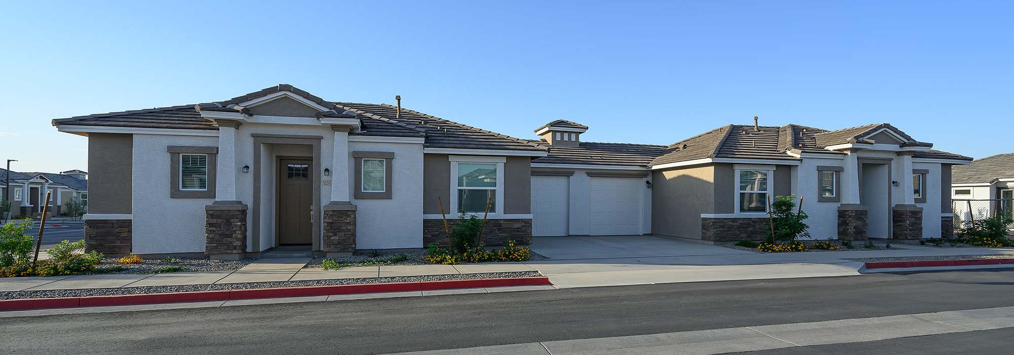 Attached garages at The Montgomery at Rancho Mercado in Surprise, Arizona