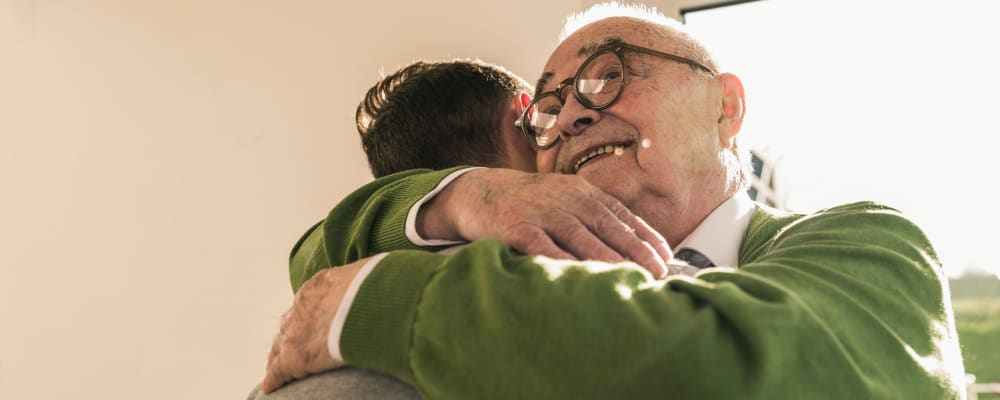 Two people embracing at Ridgeline Management Company in Rockwall, Texas