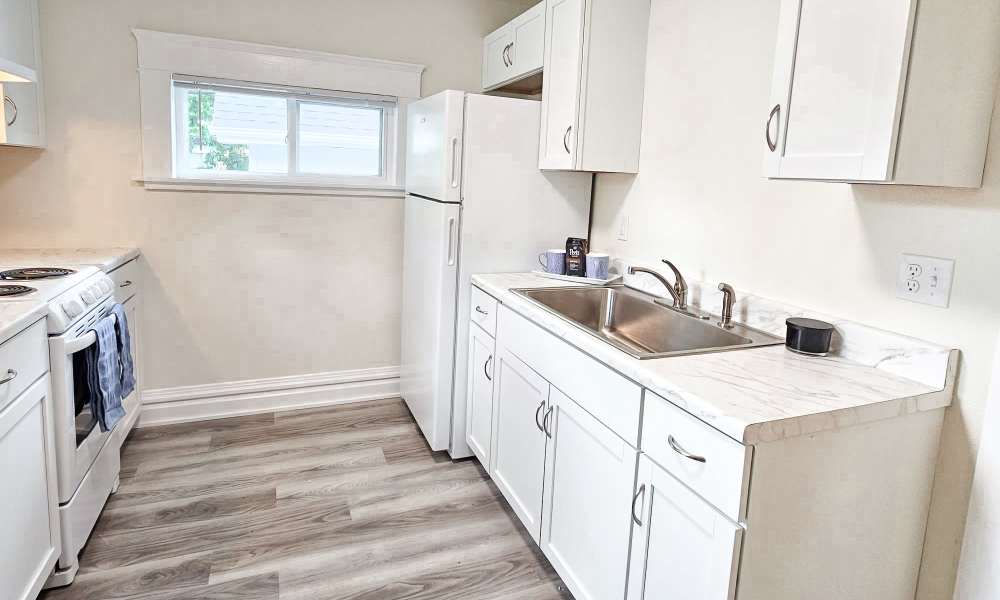 Kitchen with sink and cupboards at PK Companies in Okemos, Michigan