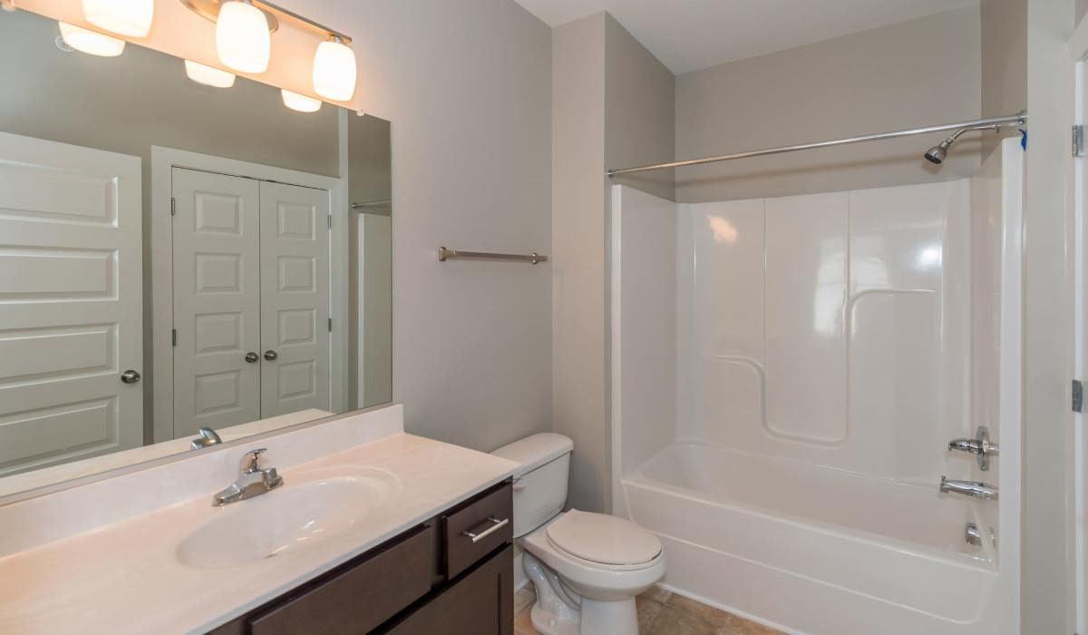 Bathroom with tub and shower at The Amber at Greenbrier, Chesapeake, Virginia