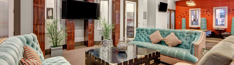 A television lounge at City Center on 7th Apartment Homes in Pembroke Pines, Florida