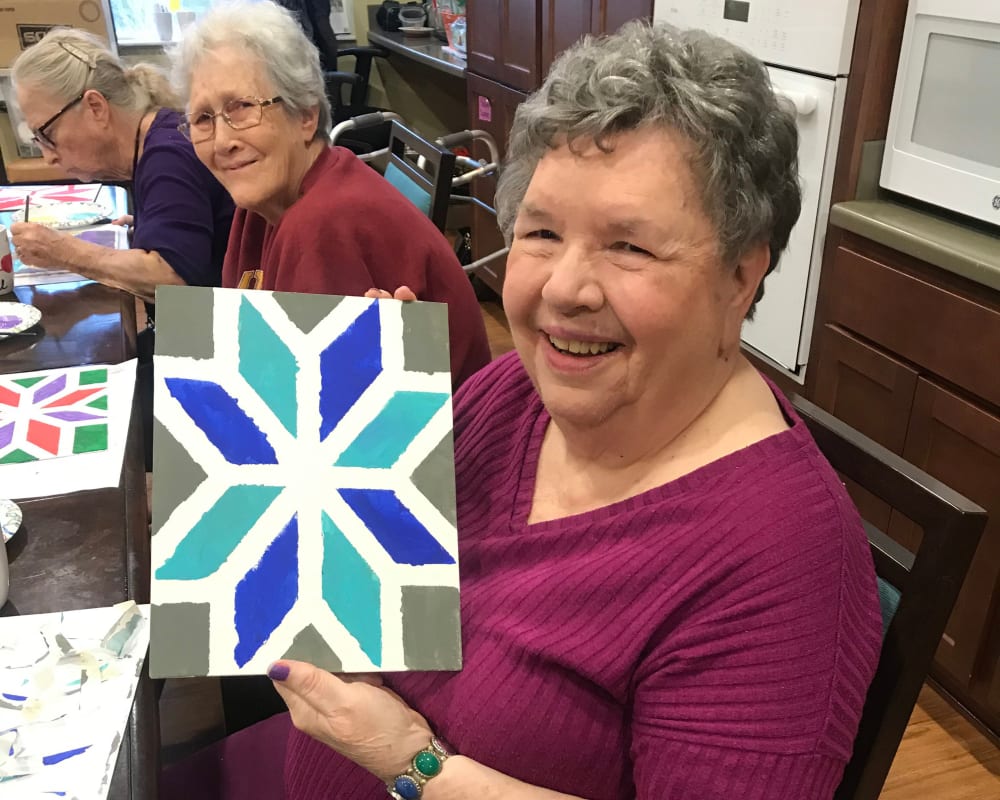 Resident creating art at Edencrest at Green Meadows in Johnston, Iowa.