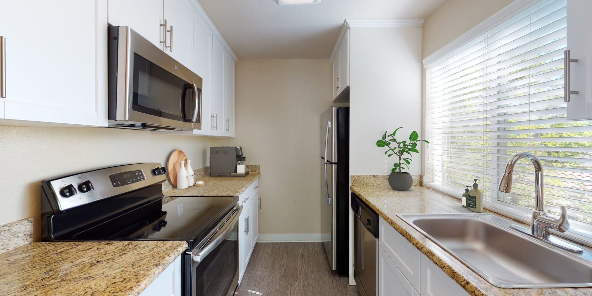 Two-bedroom apartment's kitchen at Valley Plaza Villages in Pleasanton, California