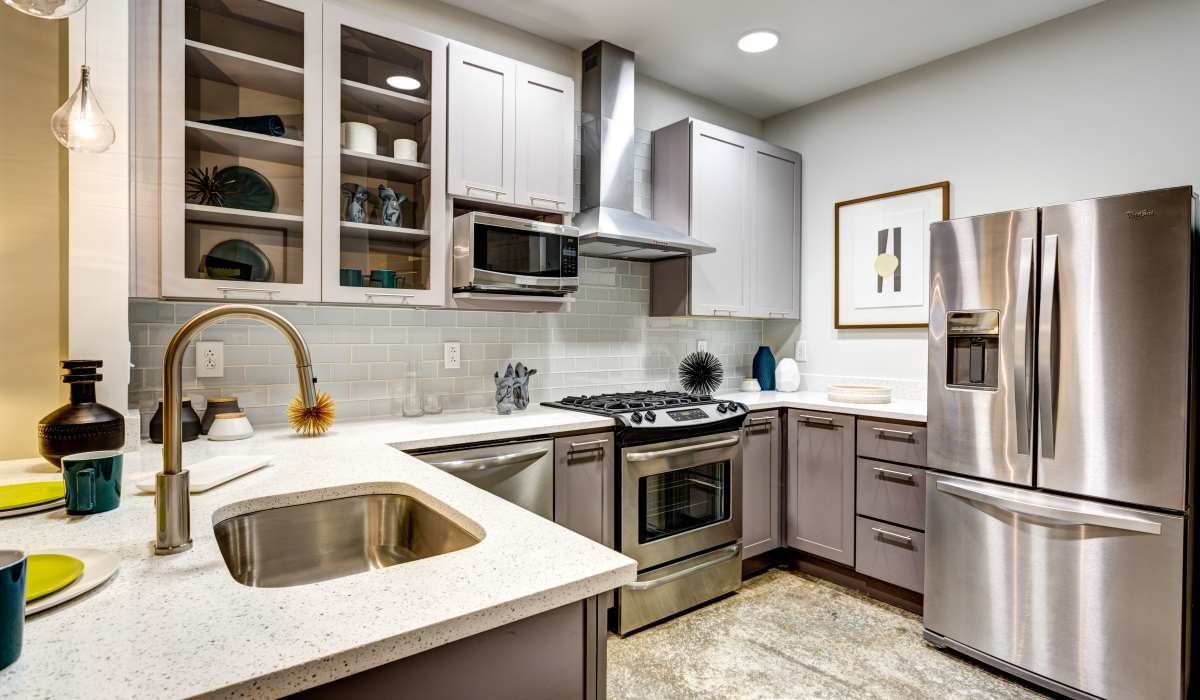 Kitchen with stainless-steel appliances at Attain Downtown, Norfolk, Virginia