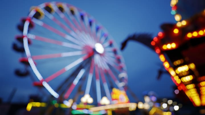 Ferris wheel set against the night sky