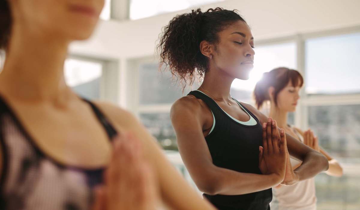 A group of residents doing yoga together at Copper Range in Colorado Springs, Colorado