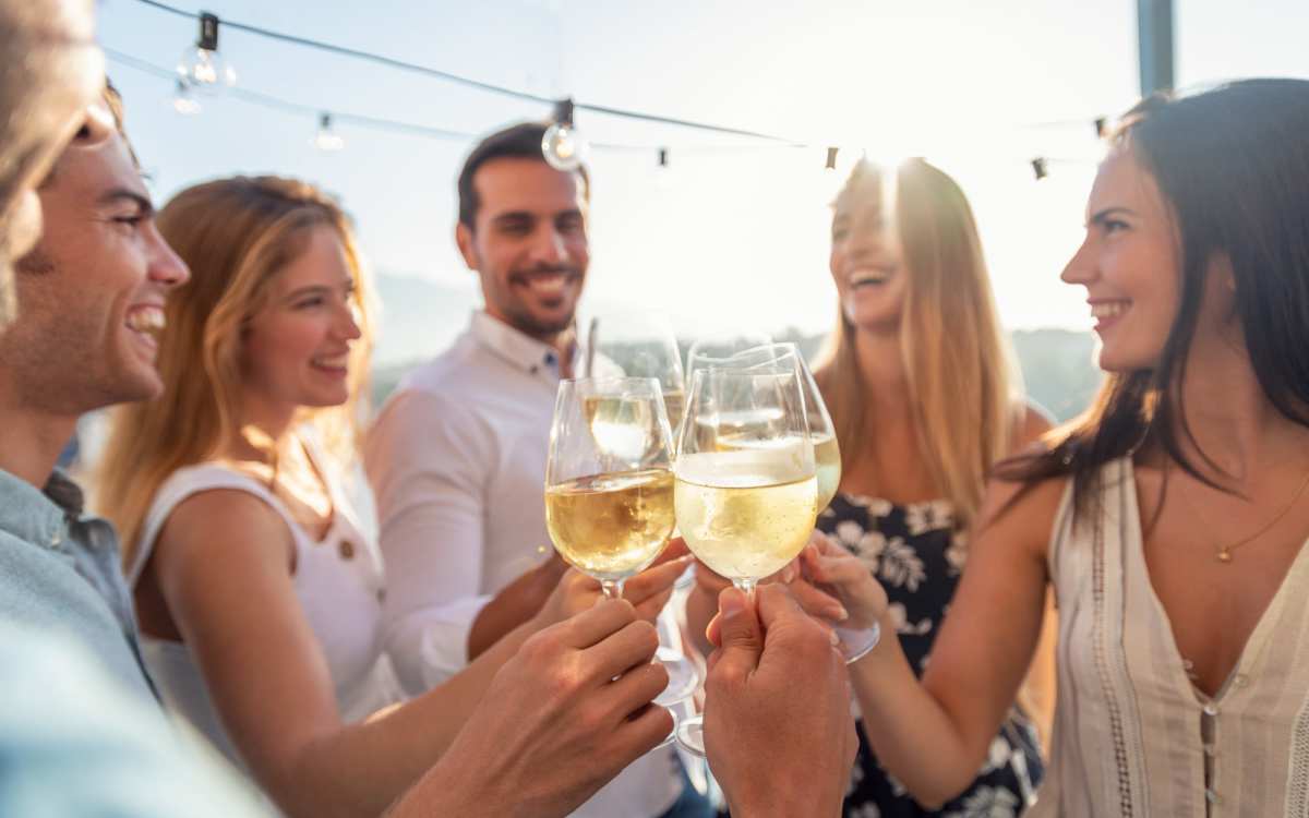 Residents having drinks in beach party near El Cid Apartments in West Palm Beach, Florida