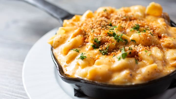 A close-up of a bowl of macaroni and cheese with breadcrumbs from a restaurant in South Jordan.