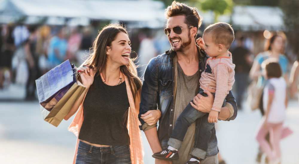 Resident family after shopping near Huntington Reef in Huntington Beach, California