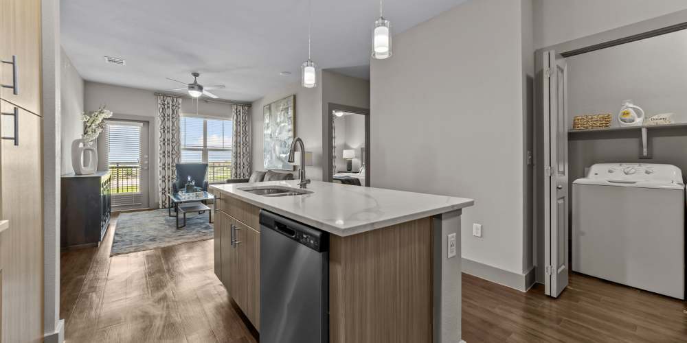 Apartment with a washer and dryer at Harbor Hill in Rockwall, Texas