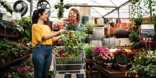 Women buying flowers in a flower shop near Villas At Millbrook in Fresno, California