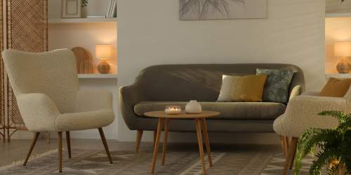 Cozy living room with stylish seating and warm lighting at Magnolia Heights in Charlotte, North Carolina