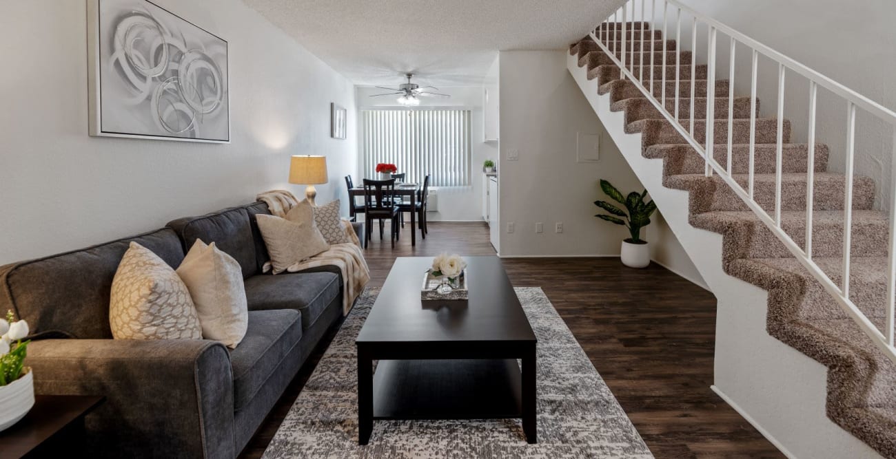 Open living space with staircase leading up to second floor at The Crossroads in Van Nuys, CA
