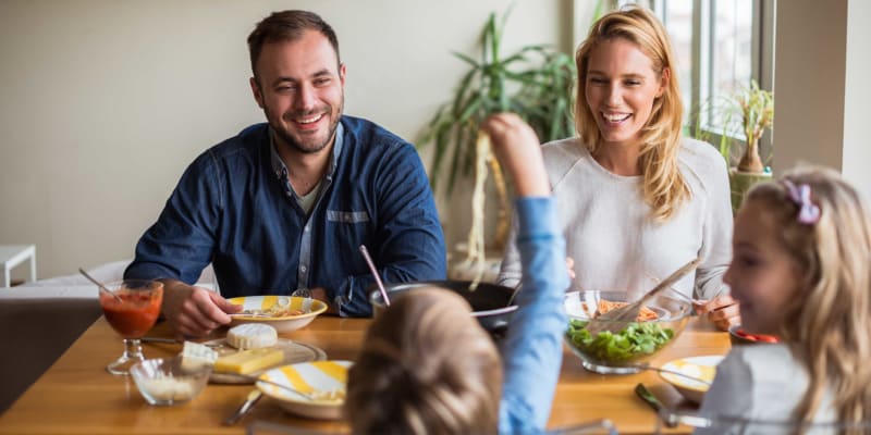 A family eating near Lofgren Terrace in Chula Vista, California