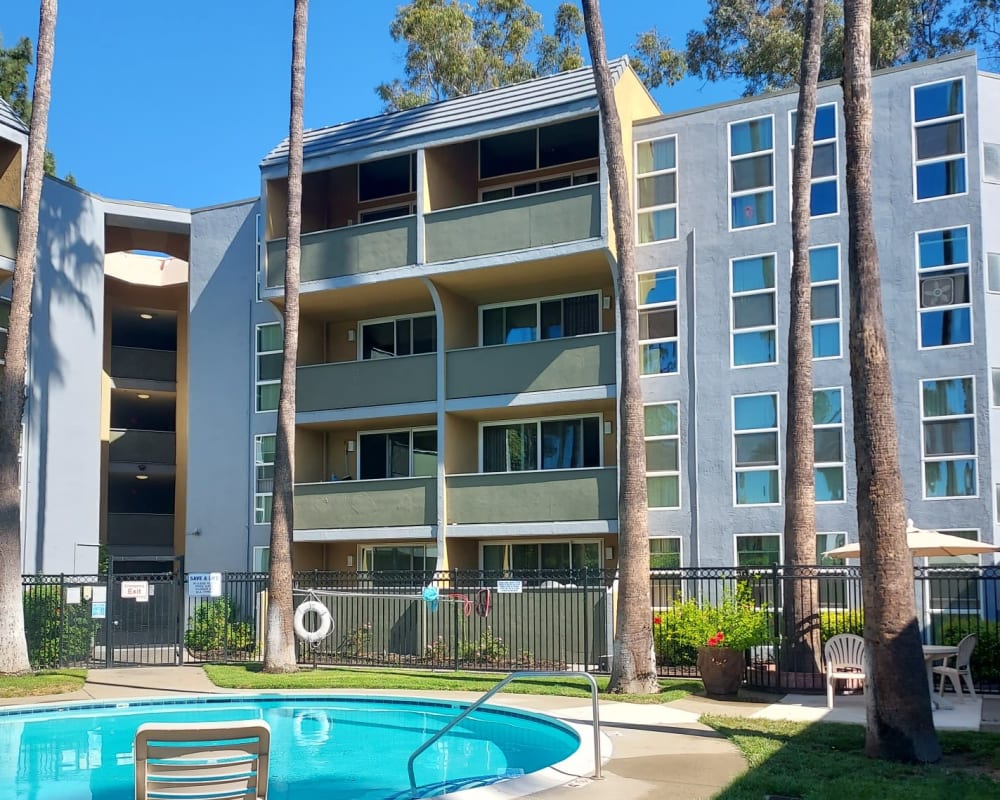 Patios overlooking swimming pool at Lakeshore Apartments in Concord, California