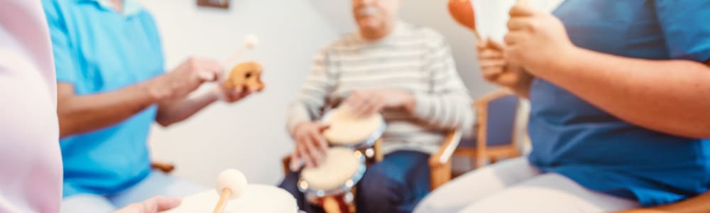 Residents playing instruments together at Ingleside Communities in Mount Horeb, Wisconsin