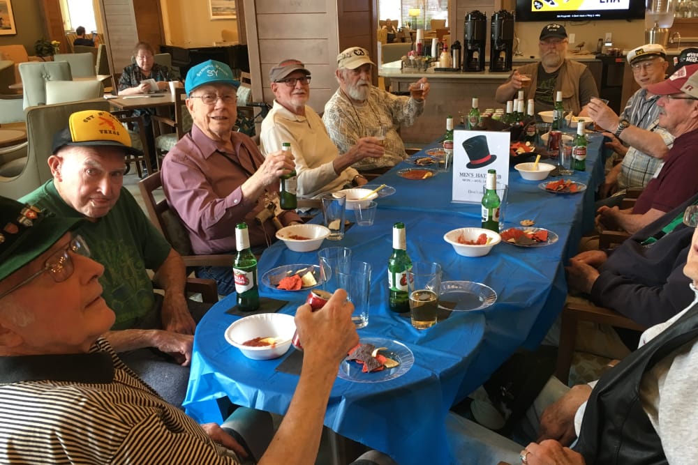 Friends and residents enjoying Anytime Dining at Merrill Gardens at Burien in Burien, Washington. 