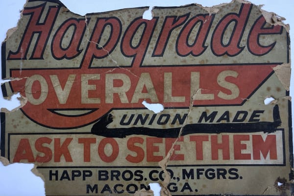 Cool old overalls sign near Broadway Lofts in Macon, Georgia