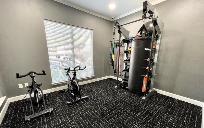 Enjoy apartments with a fitness center at The Abbey at Energy Corridor in Houston, Texas