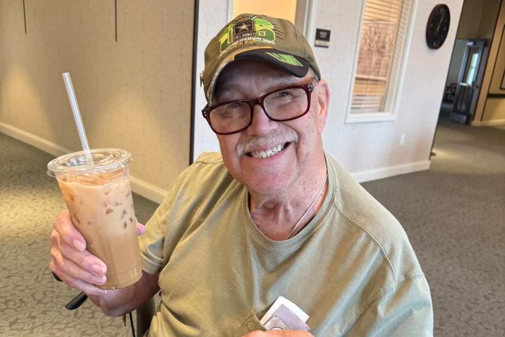 Senior having juice at Legacy Living Lexington in Lexington, Kentucky