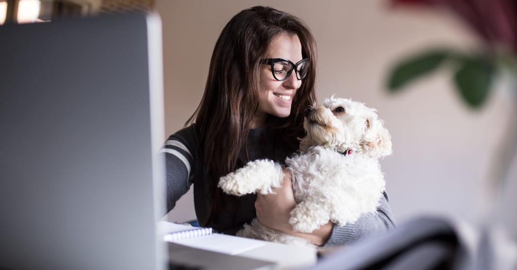Resident and her dog enjoying their new home at Cooper Creek in Louisville, Kentucky