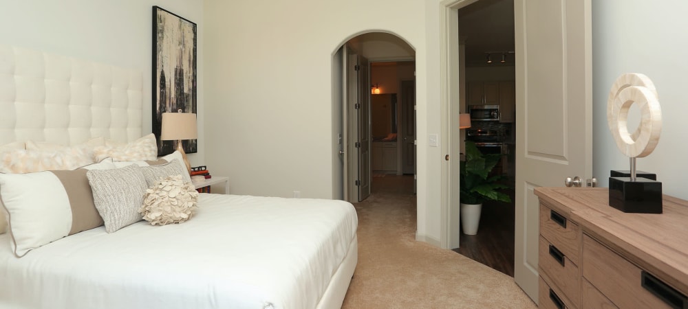 Nice well lit bedroom in a decorate model home at 2370 Main at Sugarloaf in Duluth, Georgia