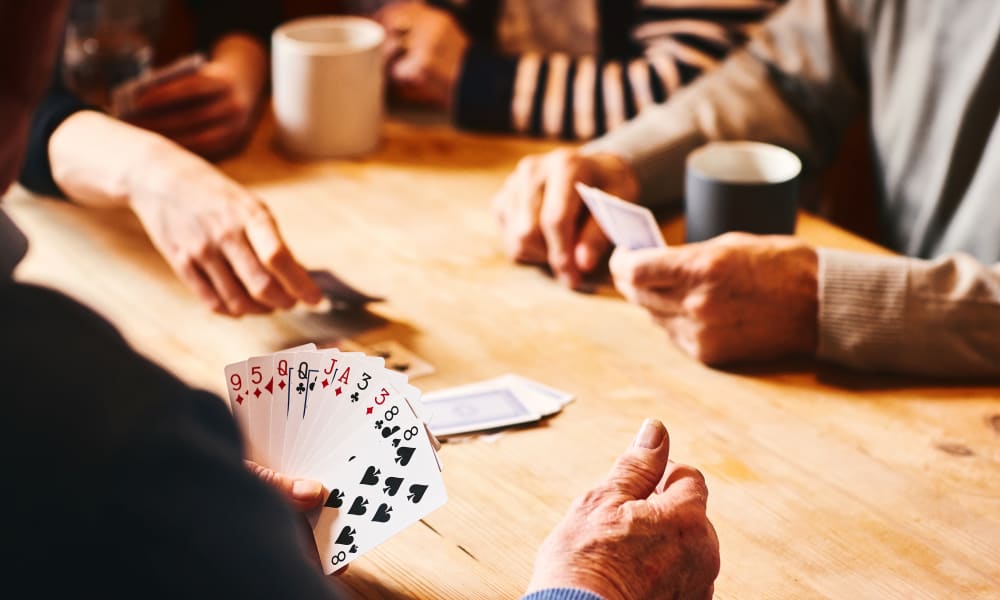 Residents playing cards at Rosewood Estates in Cobourg, Ontario