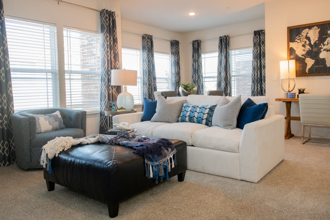 Bright, inviting living room at Artisan Crossing in Norman, Oklahoma