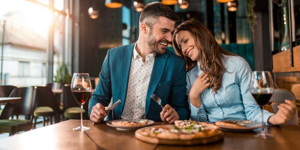 Resident couple having food near Flatiron West Trade in Charlotte, North Carolina