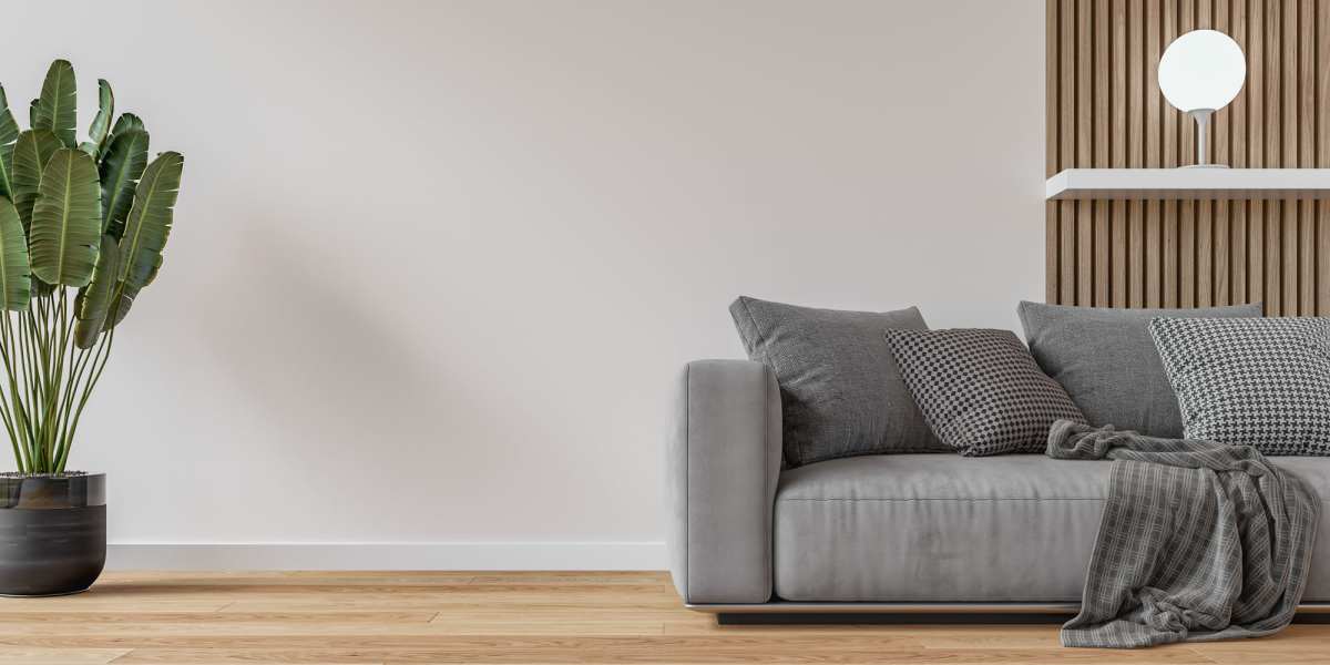 living room with Couch and a plant at Larkspur Village Apartments in Durant, Oklahoma