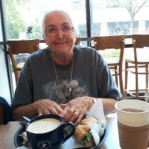 Resident Juanita enjoying breakfast at a local restaurant near Corridor Crossing Place in Cedar Rapids, Iowa.