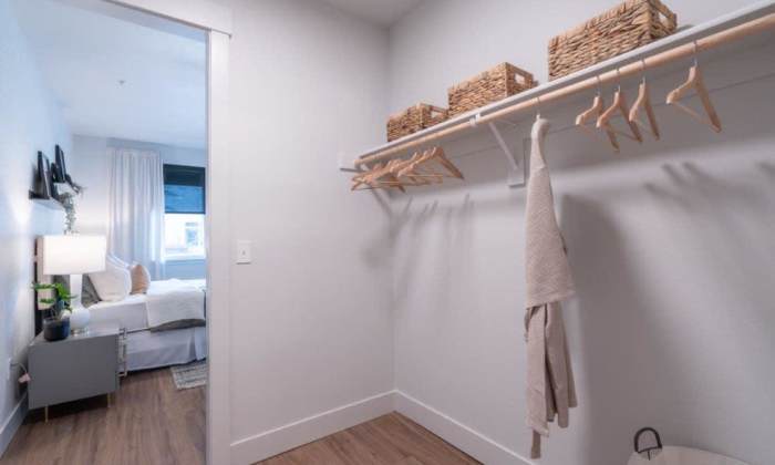 Bedroom with walk-in closet at The Heights at Happy Valley in Happy Valley, Oregon