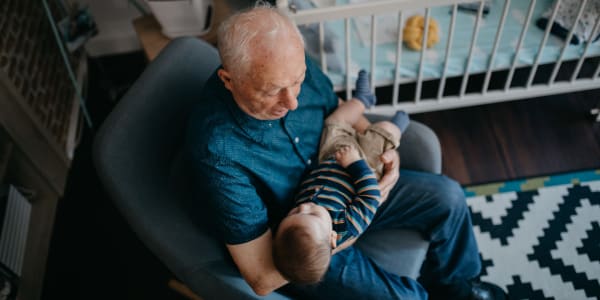 Resident holding their grandchild at Transitions At Home - Central in Stevens Point, Wisconsin