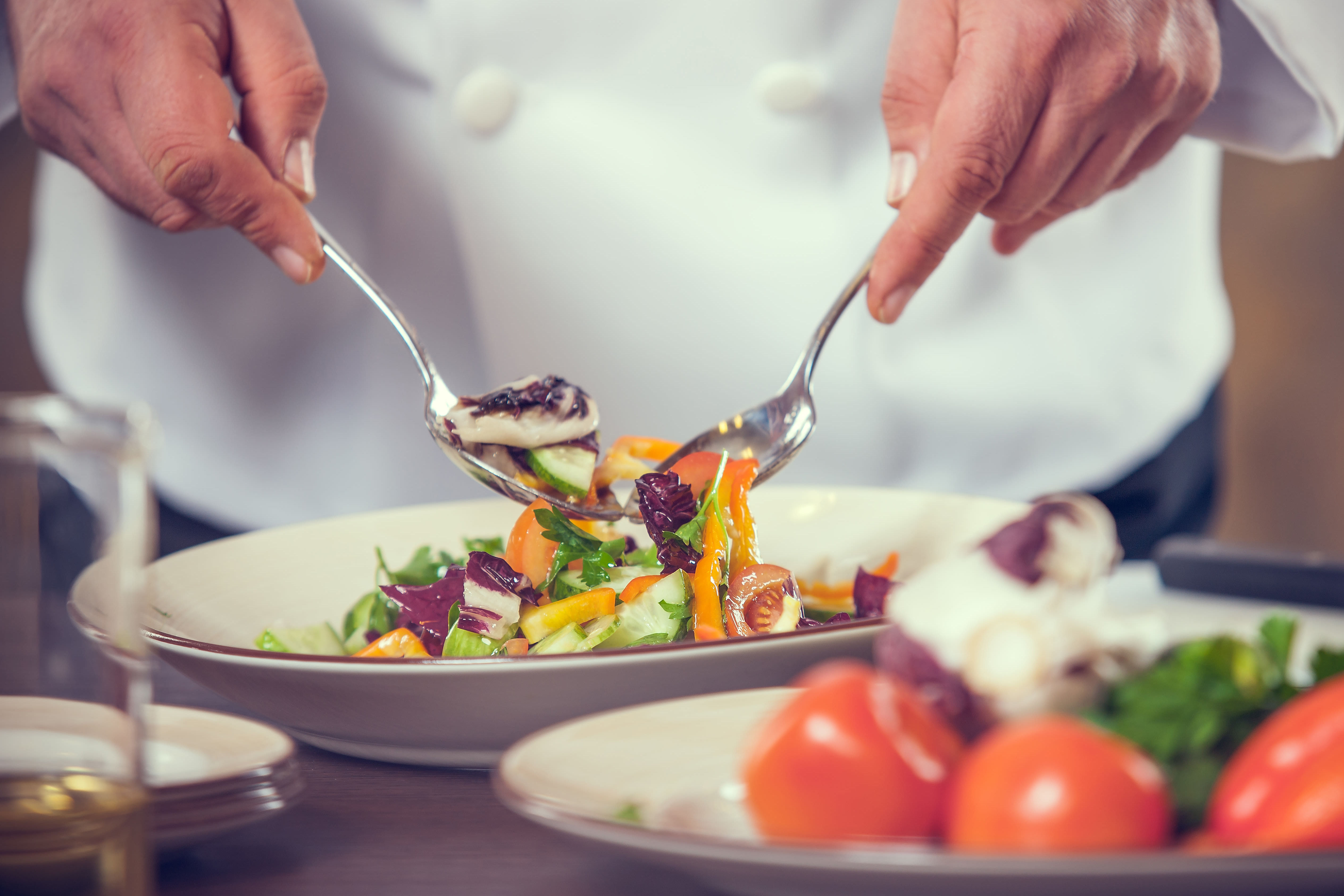 Chef making a salad at Estancia Del Sol in Corona, California
