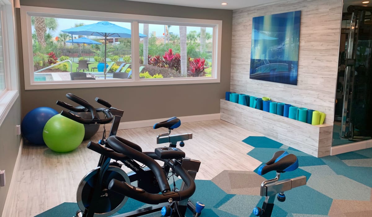 Fitness center with exercise equipment at The Preserve at Spring Lake in Altamonte Springs, Florida