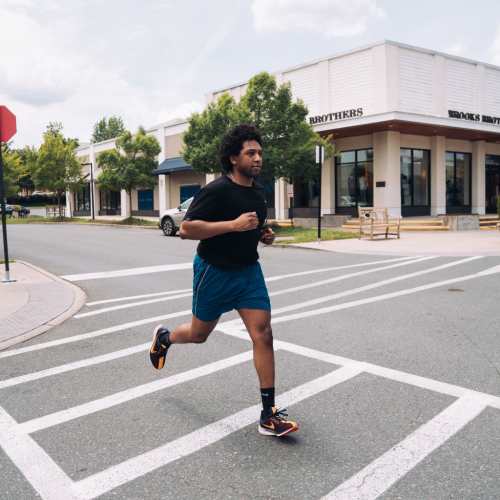 Resident jogging near The Maximillian at Stonefield in Charlottesville, Virginia