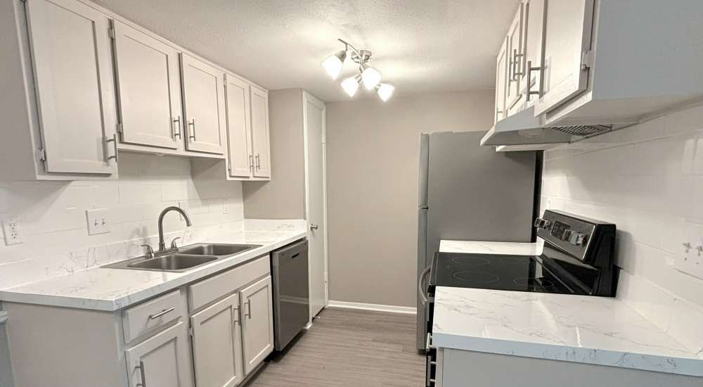 kitchen with white cabinets at The Crossing at Blue Bell in Houston, Texas