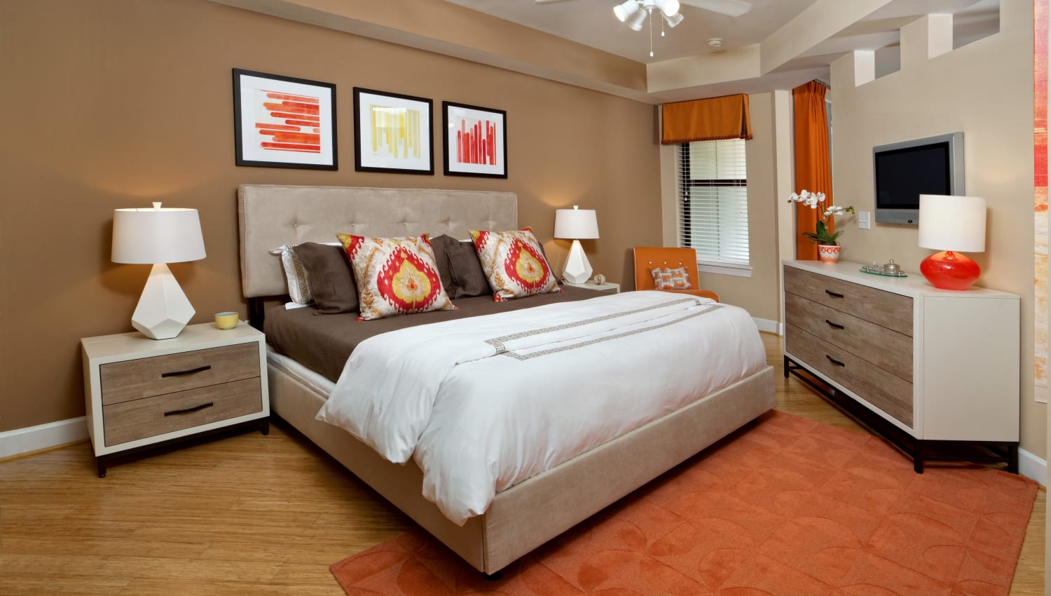 Spacious model bedroom with a ceiling fan at Cielo in Charlotte, North Carolina