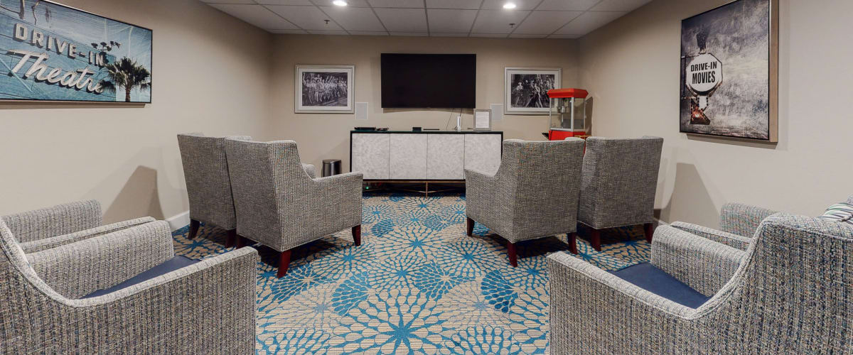 Sitting area with bookshelves at Island House in Mercer Island, Washington