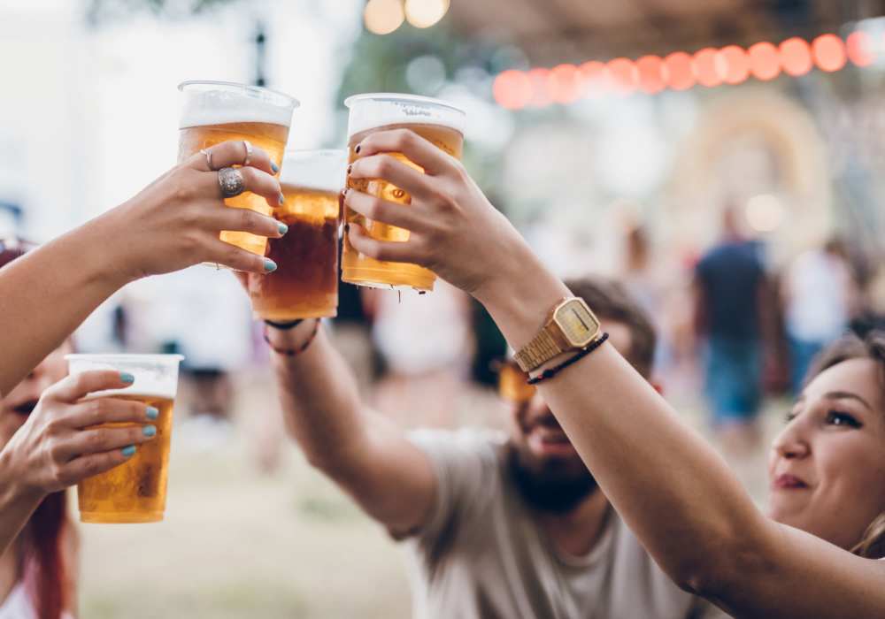 Residents raising a toast at a restaurant near Twyckenham Apartments in Lafayette, Indiana