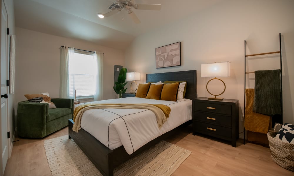 A model apartment with green and gold accents at Chisholm Pointe in Oklahoma City, Oklahoma