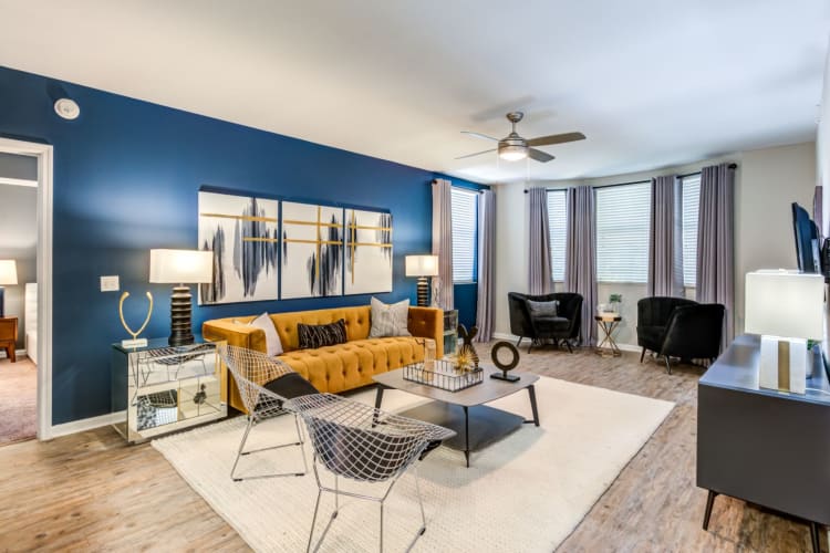 Spacious living area in decorated modern home with large windows for tons of light at The Pearl in Ft Lauderdale, Florida
