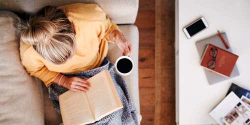 Resident reading at Mountain Breeze Villas in San Bernardino, California