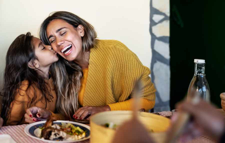 Woman and her child in a restaurant near Pin Oak Manor Apartments in Mishawaka, Indiana